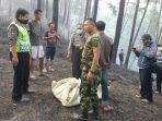 evakuasi korban kebakaran di Slahung
