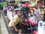 Penyerahan bantuan 40 unit motor roda tiga Viar oleh Kodim 0801 Pacitan untuk Koperasi Desa Kelurahan Merah Putih.