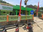 Ilustrasi Puskesmas Tegalombo Pacitan rawat korban keracunan MBG. Tampilan fasad depan gedung Puskesmas Tegalombo di Kabupaten Pacitan, digunakan sebagai foto ilustrasi terkait penanganan siswa diduga keracunan makanan.