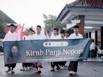 Kirab Panji Negoro Haul ke-169 KH Abdul Manan Dipomenggolo. Peserta Kirab Panji Negoro Haul KH Abdul Manan Dipomenggolo 2026 di Pacitan.