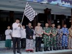 Wakil Bupati Pacitan Gagarin saat memberikan sambutan dan memberangkatkan Kirab Panji Negoro Haul KH Abdul Manan Dipomenggolo.