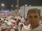 Jemaah haji Pacitan Kloter SUB 25 saat melaksanakan mabit di Muzdalifah pada pelaksanaan ibadah haji 2026.