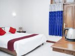 Suasana kamar hotel di Tulakan yang bersih dan nyaman