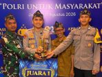 Kapolres Pacitan AKBP Ayub Diponegoro Azhar bersama Kades Nogosari, Babinsa, dan Bhabinkamtibmas menerima penghargaan Juara 1 Lomba Tiga Pilar Nasional 2026 di The Tribrata Jakarta.