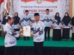 Pengukuhan pengurus PGRI Kabupaten Pacitan dan peluncuran program PGRI POWER di Gedung PGRI Pacitan, Sabtu (1/8/2026).