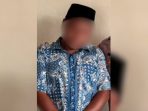 Potret pria terduga pelaku perundungan terhadap pemuda penyandang disabilitas di Arjosari, Pacitan, dengan wajah sengaja disamarkan.