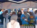 Suasana bazar 25 UMKM binaan Rumah BUMN Pacitan dalam acara AKNP Youth Festival 2026 pada peringatan Dies Natalis ke-13 AKN Pacitan.