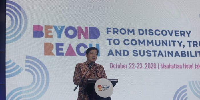 Staf Ahli Kemenko Perekonomian Haryo Limanseto memberikan pidato kunci dalam Local Media Summit 2026 di Manhattan Hotel Jakarta.